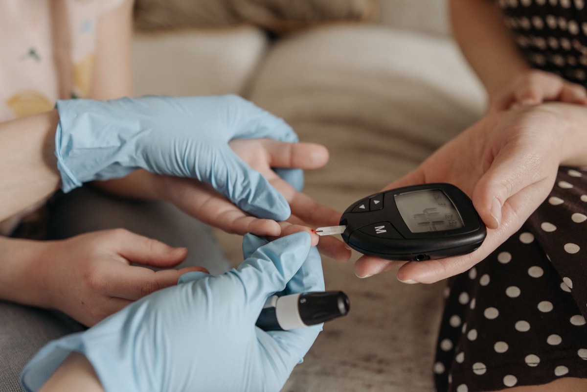 Top-down view of a digital glucose meter for blood sugar monitoring