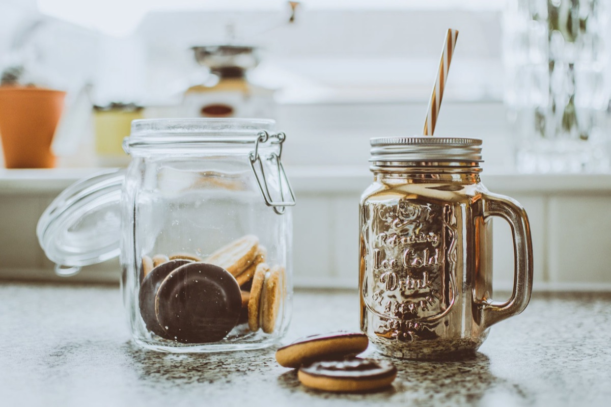glass jar with golden liquid